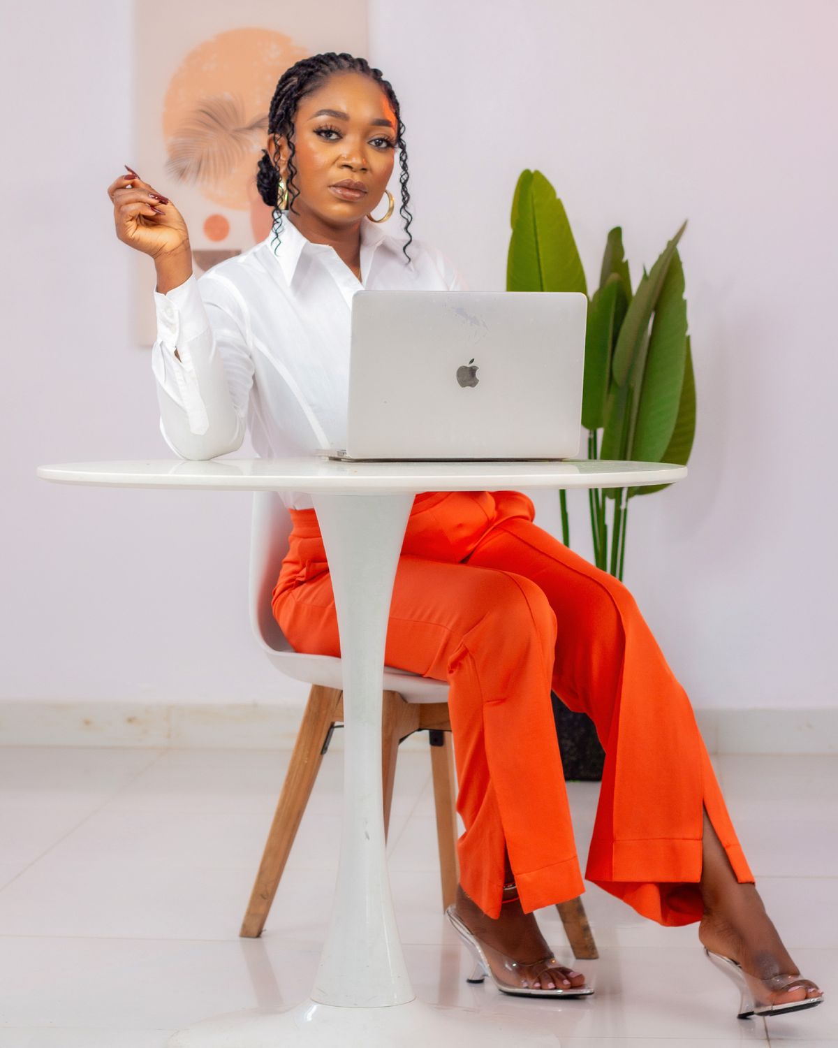 A businesswoman working at a desk in a Lagos office